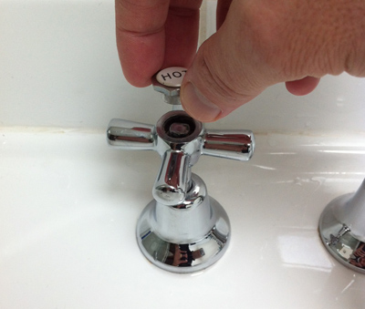 Removing the button on top of the tap